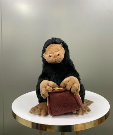 PELUCHE ESCARBATO CON BOLSO